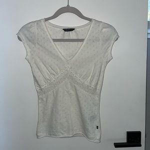 Beautiful white shirt with crochet and beaded detailing